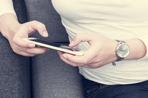 Person checking their mobile phone